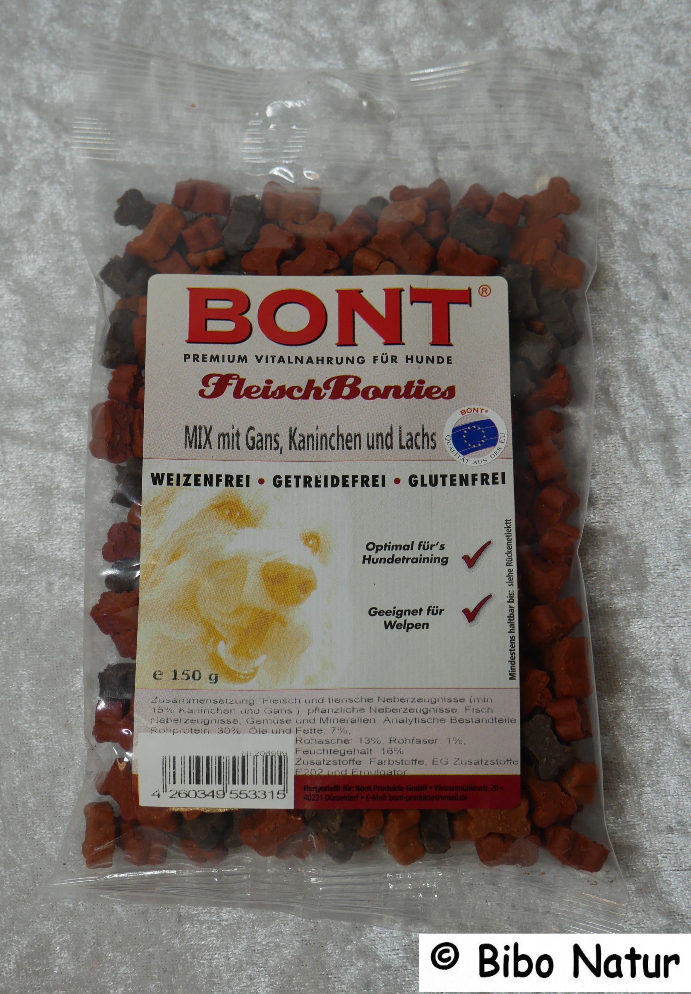 hundertfünfzig Gramm dunkelbraune und orange Leckerlies in Hundeknochenform