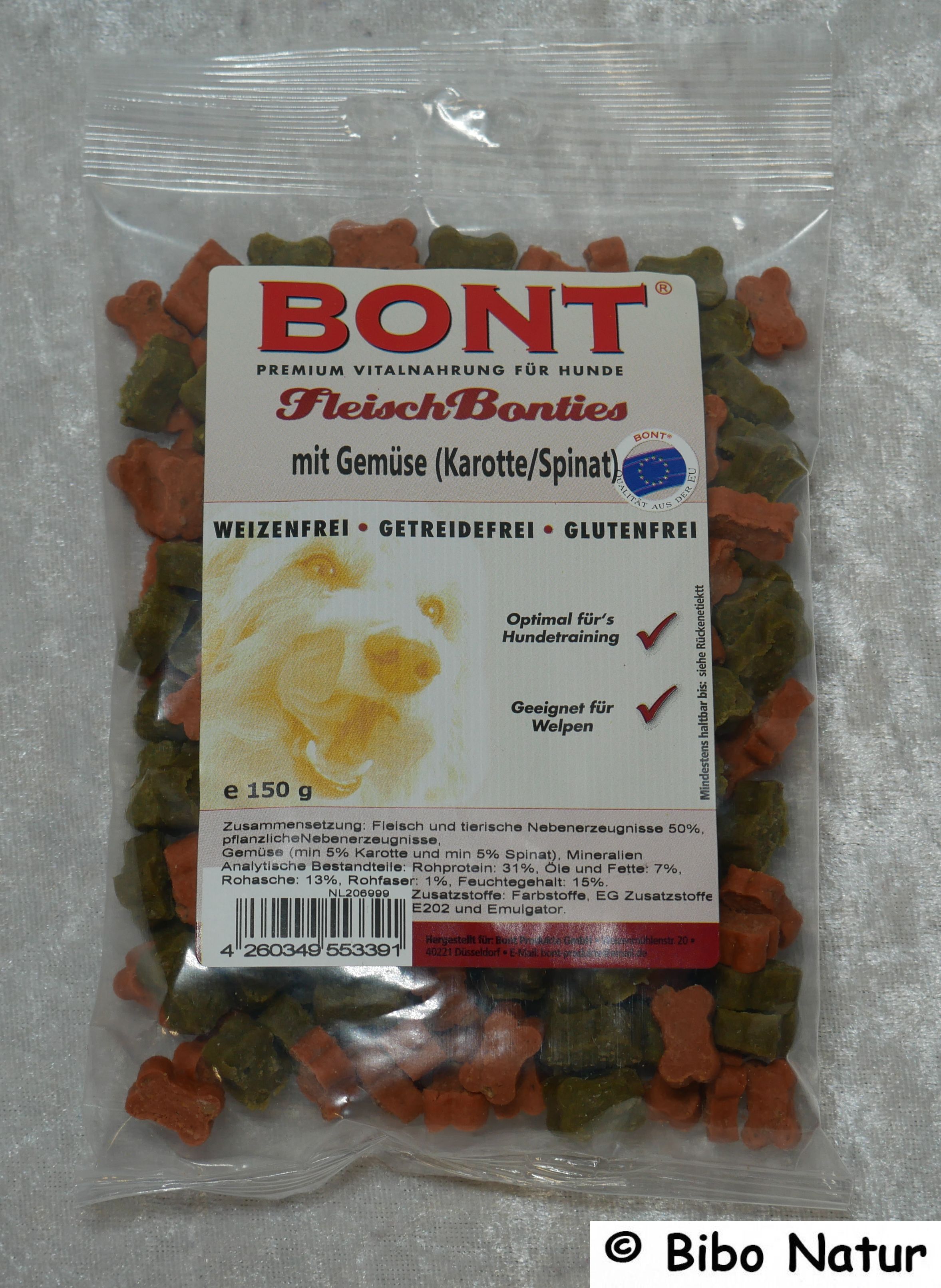 hundertfünfizig Gramm orange und grüne Leckerlies in Hundeknochenform